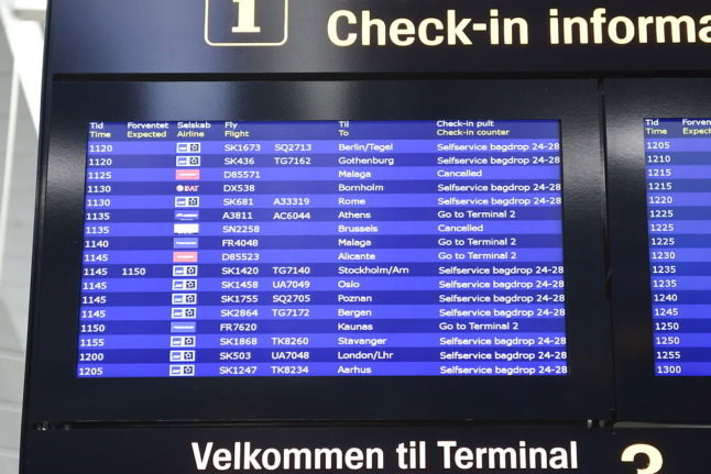 Departures information at Copenhagen Airport. Denmark is to ease and simplify its Covid-19 travel restrictions by the end of October..