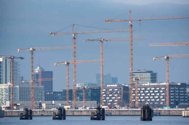 Cranes on building sites in Hamburg's HafenCity district