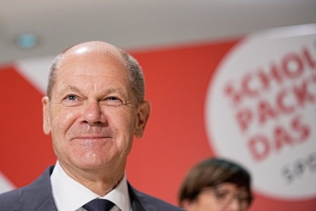 The SPD's chancellor candidate Olaf Scholz speaks to reporters in Berlin on Wednesday.