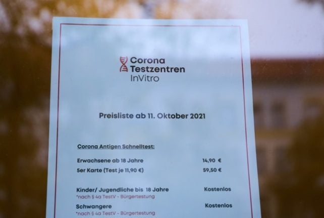 A sign shows the costs of Covid-19 rapid tests at a test centre in Berlin