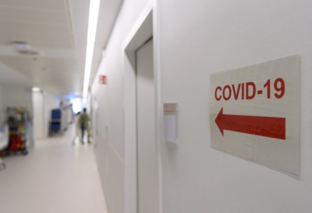 A sign to a Covid-19 ward in a Dresden hospital.
