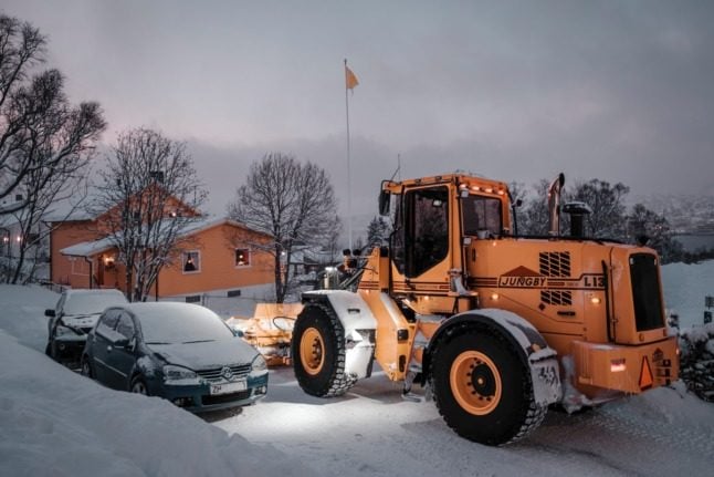 Authorities in Norway have encouraged motorists to switch to winter tyres. Pictured is a snowplow clearing the road. 