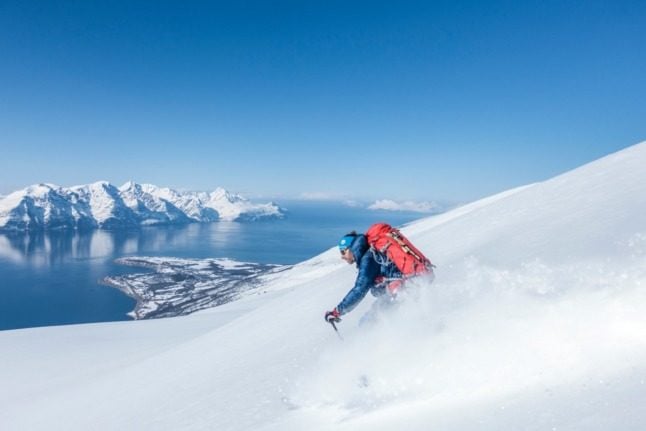 Many are hoping for a more typical ski season in Norway this year. Pictured is someone back country skiing in Olderdalen, northern Norway.