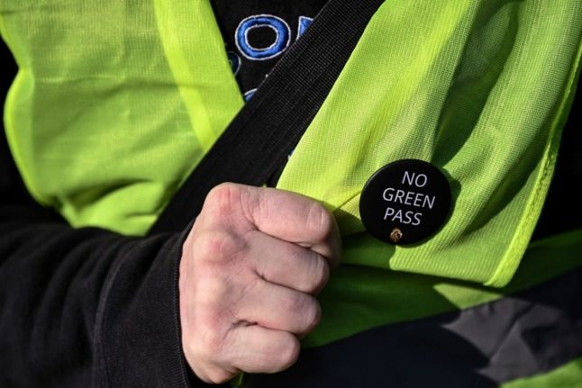 There have been protests against Italy's new 'green pass' requirement at workplaces.
