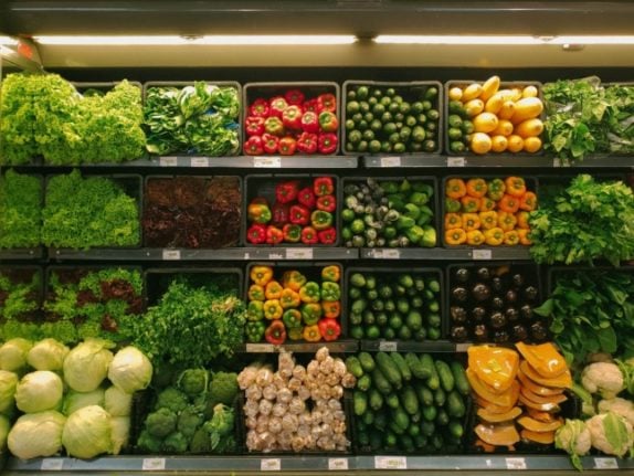 Supermarkets and suppliers are facing increased costs, which they say will be passed onto consumers. Pictured is a vegetable aisle in a supermarket. 