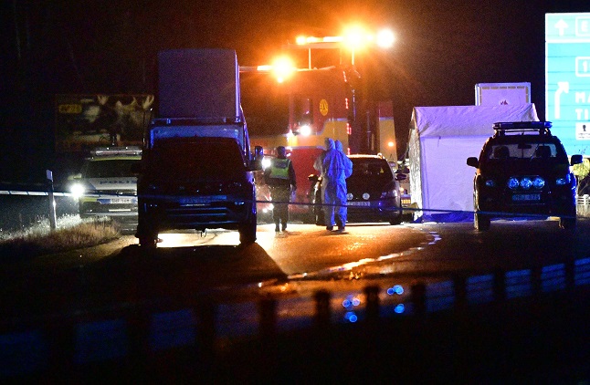 Emergency services and police at the scene of a car crash