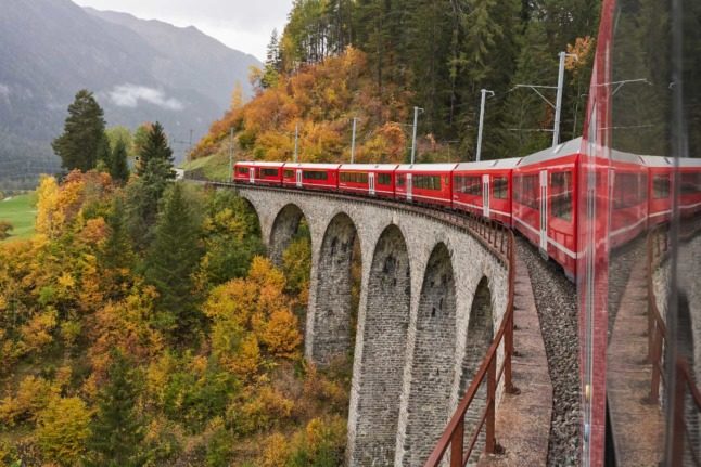 A train weaves its way through Albula, Bergün/Bravuogn, in Switzerland. Photo by Xavier von Erlach on Unsplash