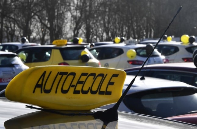 Driving school vehicles sat in a car park in Bordeaux, France. Driving lessons can be paid for, for free, via CPF. 