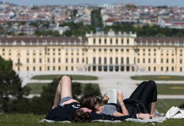 A couple pictured reading.