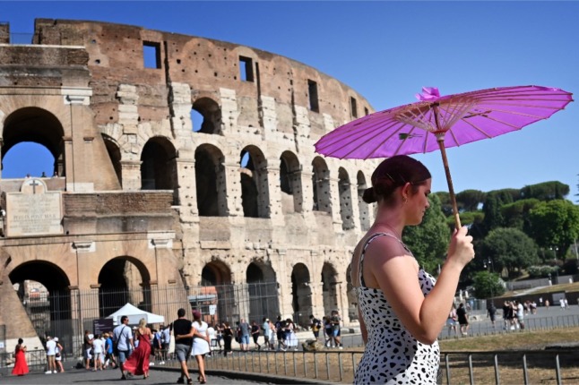 People outside the Colosseum in Rome, Italy.