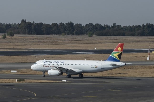 A South African Airways (SAA) flight is seen on the tarmac before departing from the O.R. Tambo International Airport