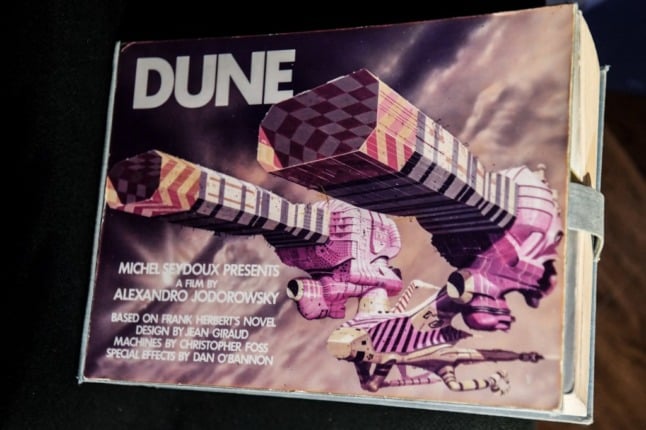 One of the ten storyboard copies for the 1970s 'Dune' adaptation is displayed to the public before an auction at Christie's Paris gallery. The project never went ahead after running out of funding.