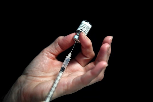 Vaccine is drawn into a syringe. The French Health Minister has introduced new measures around booster doses, masks and schools. We have broken down the key dates. 