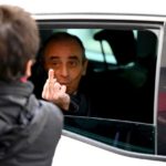 France’s Zemmour gives finger to critic as campaign woes mount
