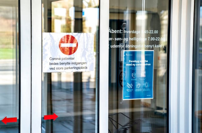 A file photo of Covid-19 information signs at a Danish hospital entrance. The coronavirus is rated a 