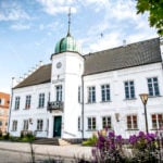 What benefits does life in provincial Denmark offer foreign residents?