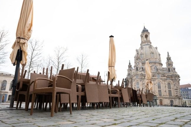 Chairs stacked at a restaurant/cafe in Dresden during Covid restrictions in April 2021. 