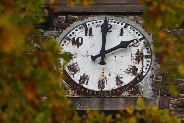 View of the clock on the tower of the Martin Luther Church in Schönhagen, Lower Saxony.