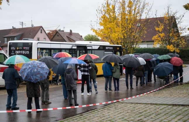 People queue for a vaccination bus in Notzingen, Baden-Württemberg. 