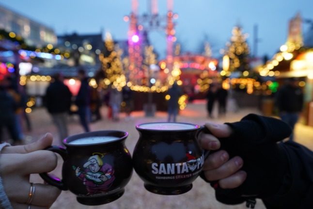 Revellers enjoy mulled wine at the 'Santa Pauli' Christmas market in Hamburg on November 15th.