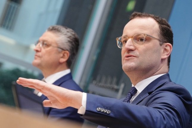 Acting Health Minister Jens Spahn and RKI chief Lothar Wieler speak at a press conference in Berlin on Friday.