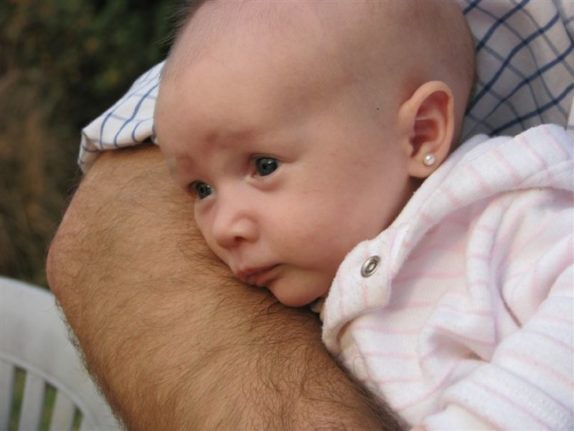 Spanish babies typically wear earrings