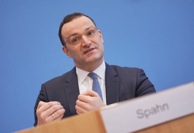 Jens Spahn at a press conference