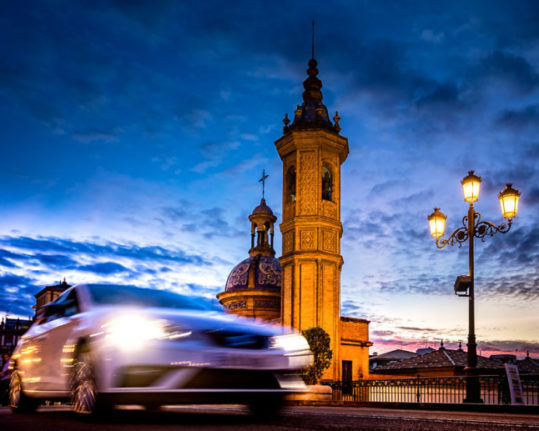 car driving in triana neighbourhood of Seville