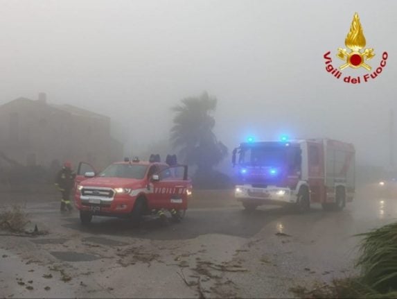 Rescue services attend to damage in Sicily  caused by the whirlwind.