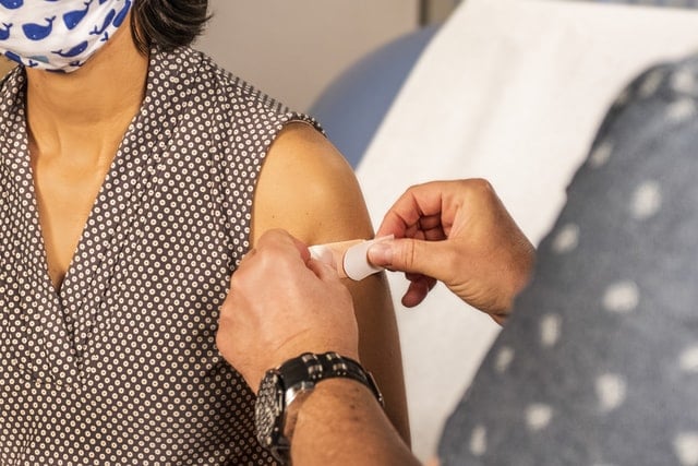 Woman gets vaccine