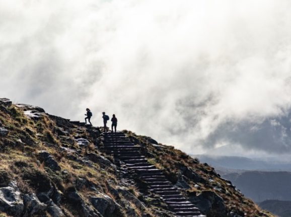 A survey from Statistics Norway has revealed how happy people are with their quality of life in Norway. Pictured is a group of people hiking Ulriken in Bergen. 