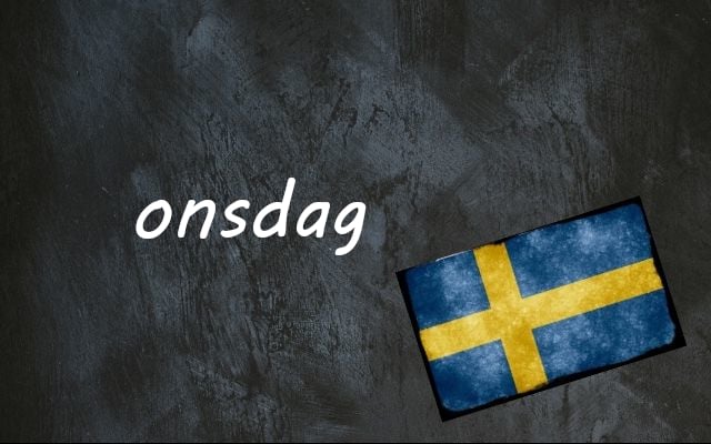 the word onsdag written on a blackboard next to the swedish flag