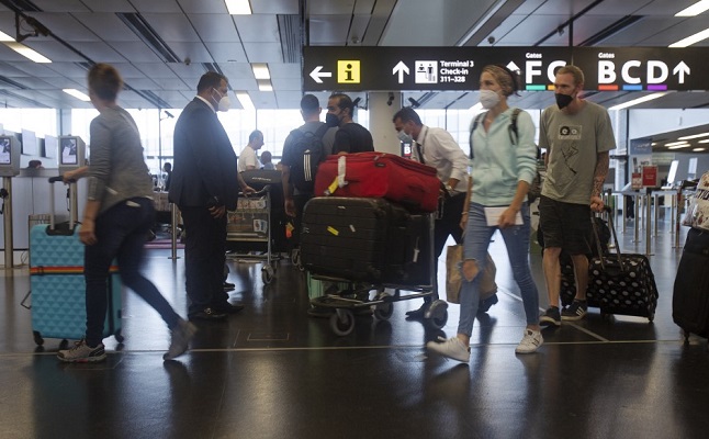 Passengers arriving at Vienna airport