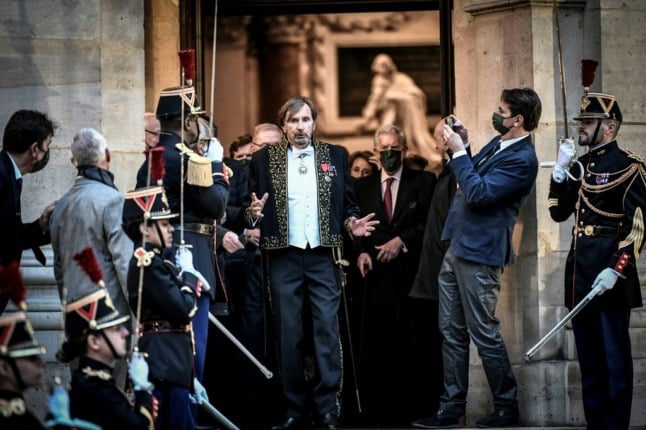 Daniel Rondeau the newest member of the Académie Française, leaves after his induction ceremony at the Institut de France