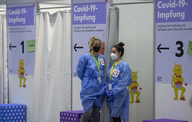 Staff at a vaccination centre in Vienna