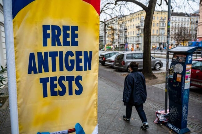 A sign says 'free antigen tests' in Berlin