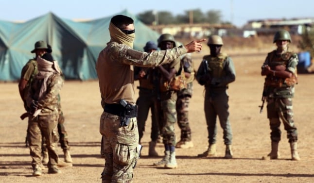 A French Special Operation Forces trains local soldiers in Mali.