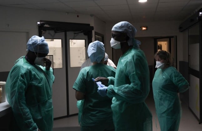Nurses work at a Covid-19 intensive care unit (ICU) of the Delafontaine AP-HP hospital in Saint-Denis, outside Paris.
