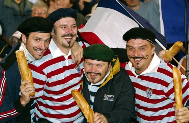 Rugby fans dress up in stereotypical French garb.