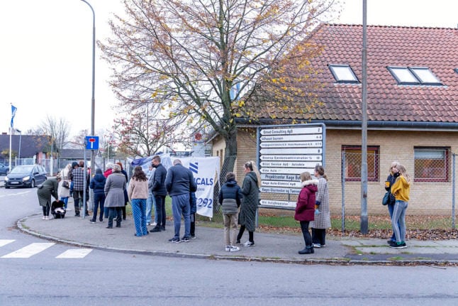 People queue for Covid-19 tests in Køge in November 2021. Denmark currently has the world's highest recorded incidence for the coronavirus.