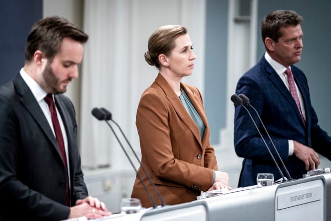 Danish PM Mette Frederiksen, business minister Simon Kollerup (L) and health authority director Søren Brostrøm present new Covid-19 restrictions on December 8th 2021.