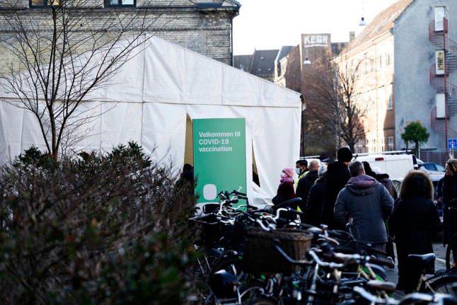 People queue for Covid-19 vaccination in Copenhagen on December16th. Several political parties have suggested they could back a limit on public assembly in response to spiralling cases.