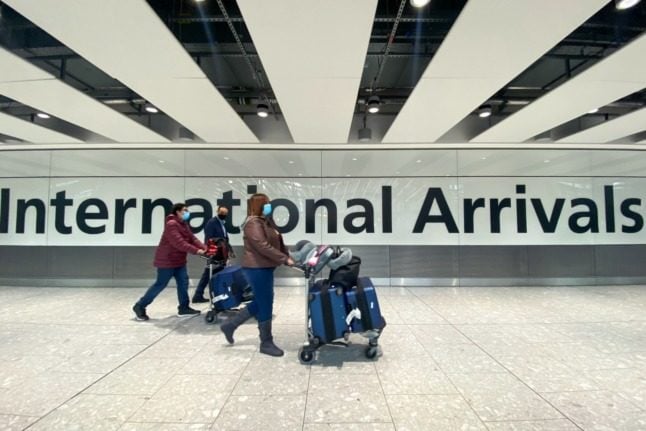 People arrive at Heathrow Airport in London on November 26th. 