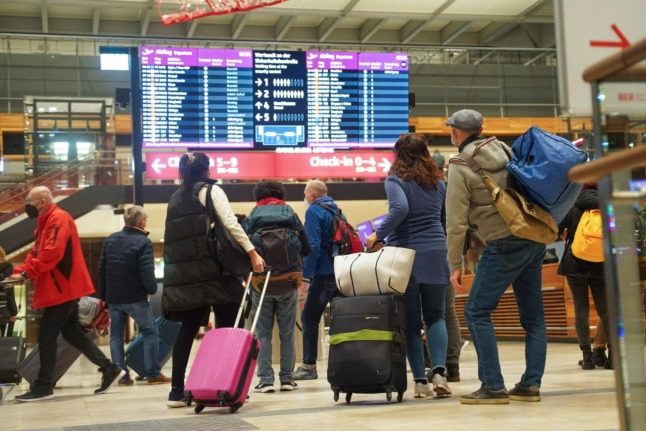 Travellers at BER airport in Berlin