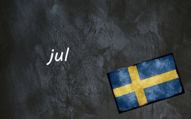 the word jul on a black background by a swedish flag