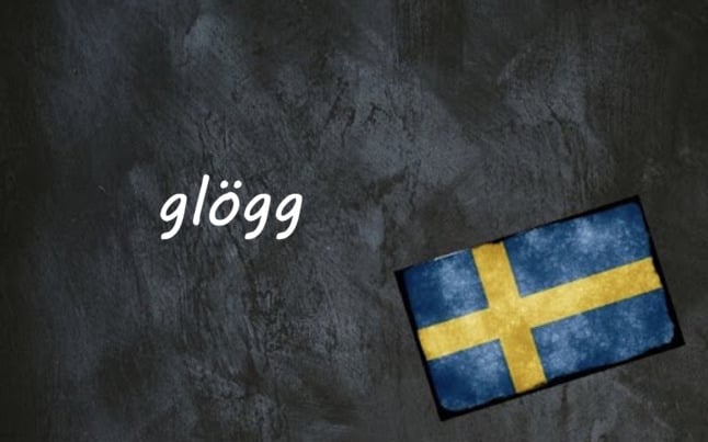 the word glögg on a black background next to a Swedish flag
