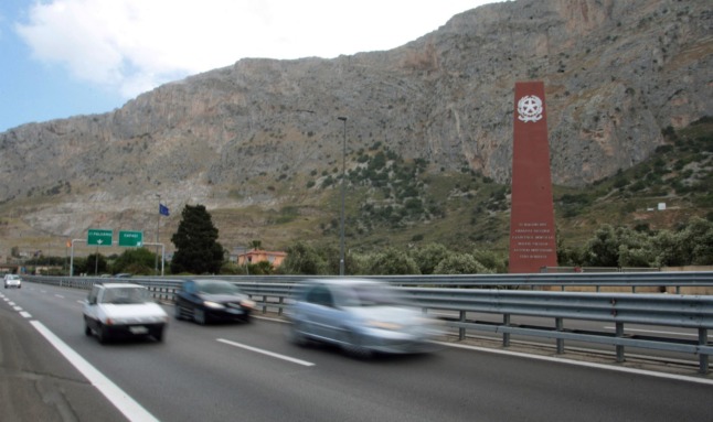 A Sicilian man has been arrested for faking blindness after he was filmed driving and window shopping