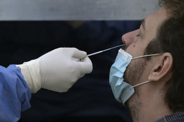 These nasal swabs will add quite a bit of money to the cost of foreign travel. Photo by JUAN MABROMATA / AFP