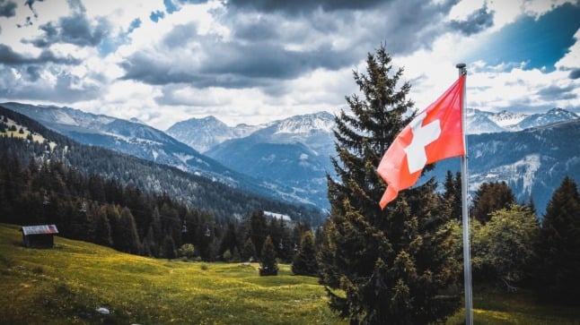 A picture of the Swiss flag. Photo: Janosch Diggelmann on Unsplash