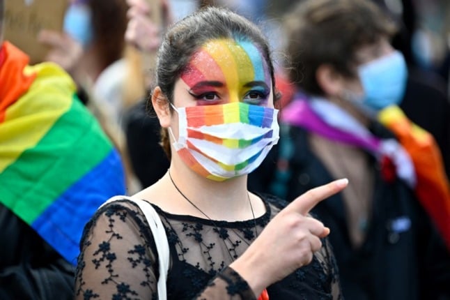 An LGBT activist protests in France. 
